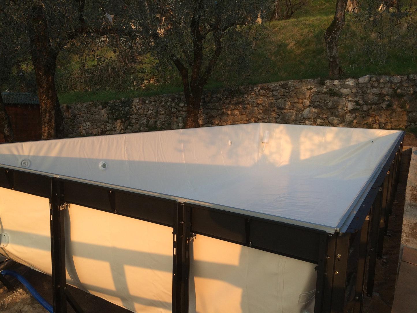 Aufstellpool kaufen 3x7 mit Holz und Stein