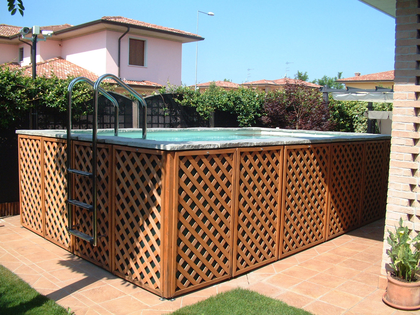 Aufstellpool kaufen 3x6 mit Holz und Stein