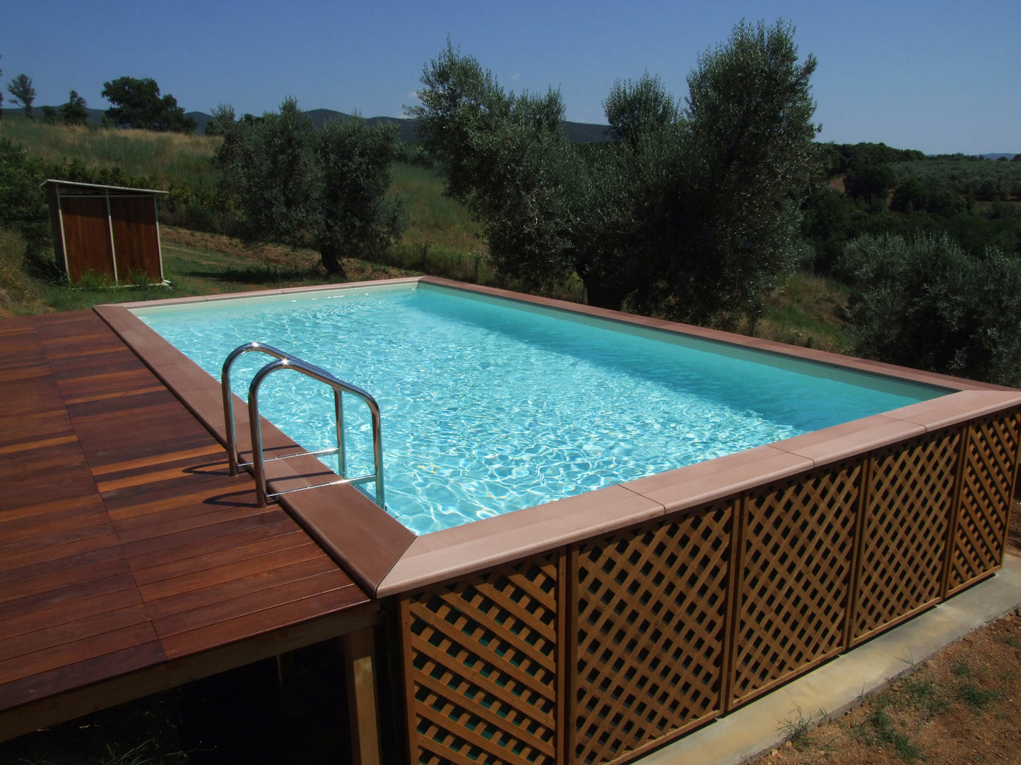 Aufstellpool kaufen 3x6 mit Holz und Stein